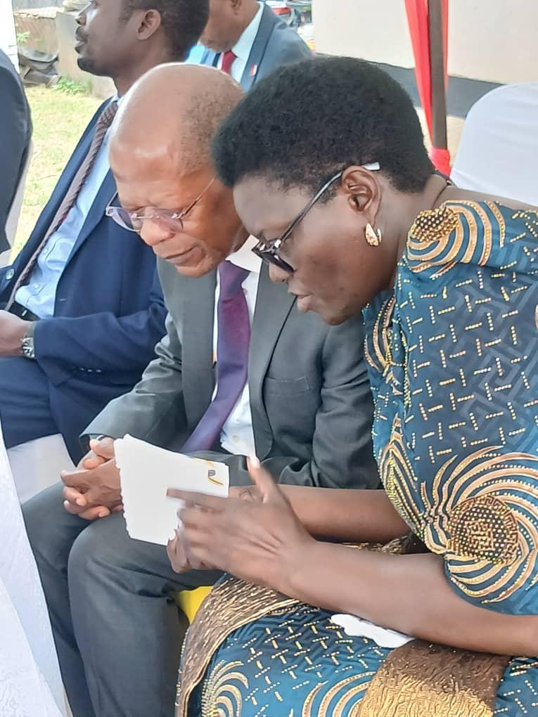 The Minister follows the ceremony programme with invited guests