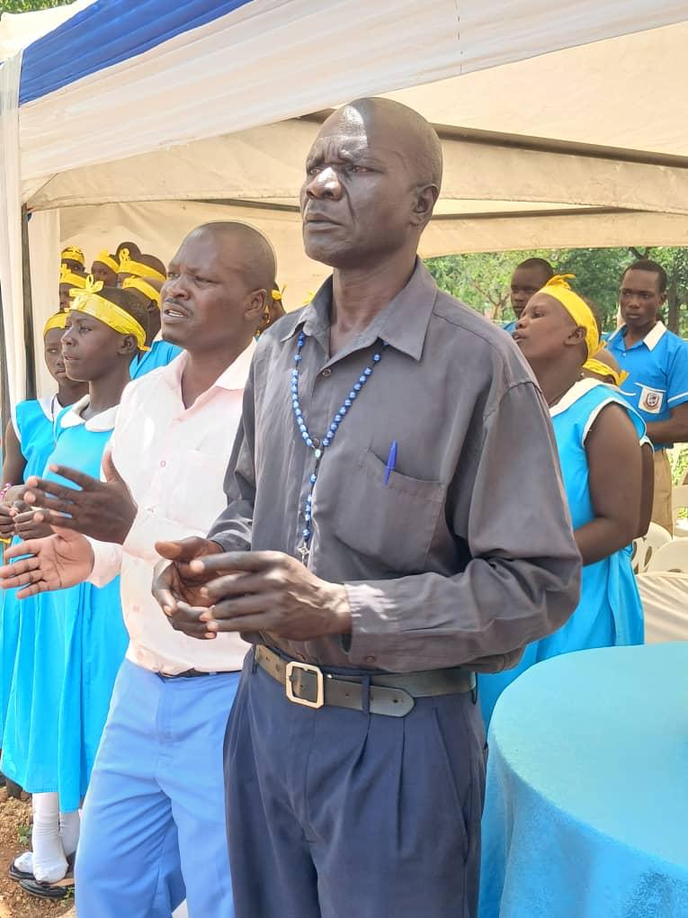 Staff, students and community members at the service