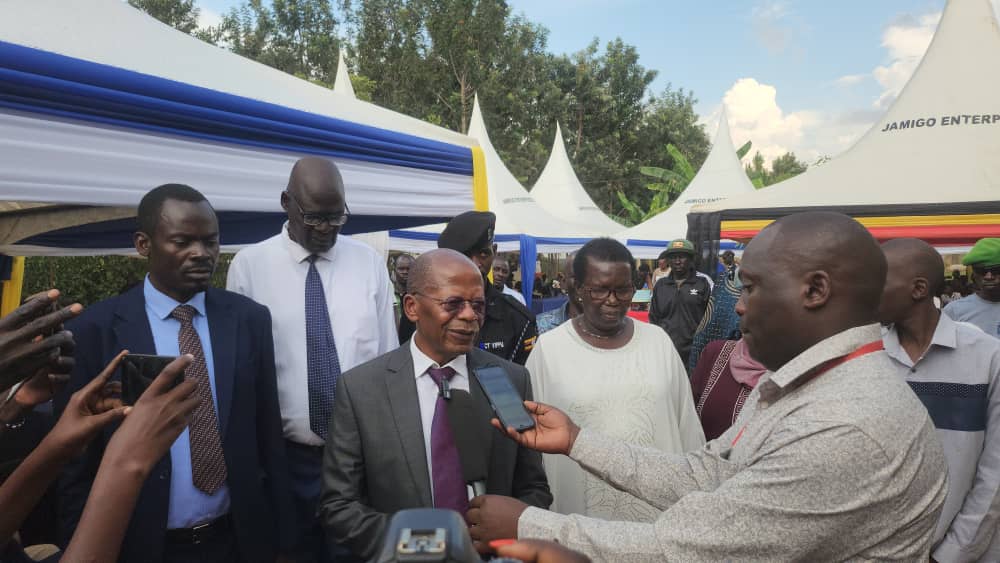 The Minister speaks to the press after the commissioning