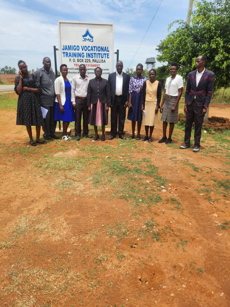 Pioneer staff at the institute signpost