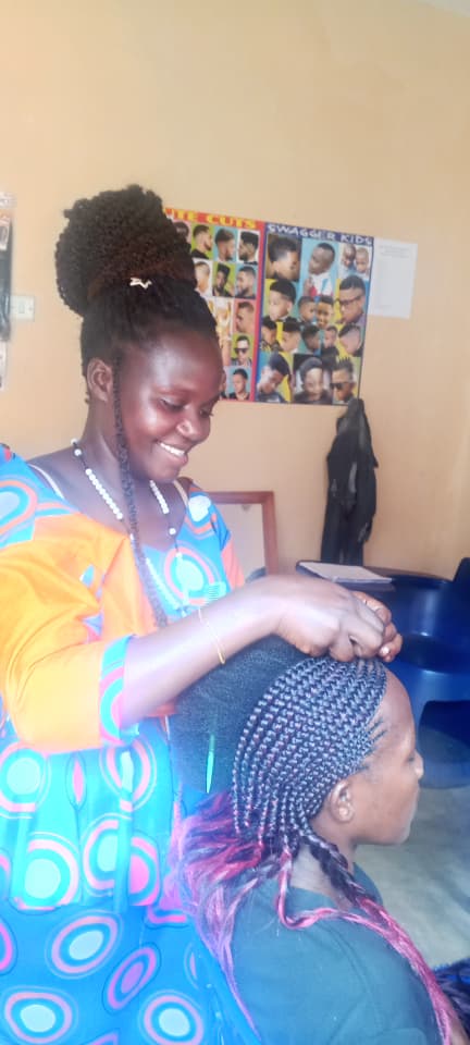 A student practises braiding